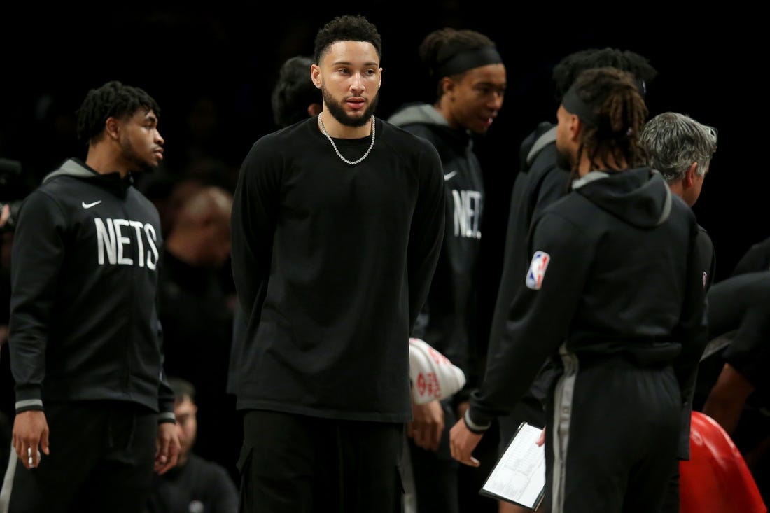 Mar 31, 2023; Brooklyn, New York, USA; Brooklyn Nets injured guard Ben Simmons (10) during a time out during the third quarter against the Atlanta Hawks at Barclays Center. Mandatory Credit: Brad Penner-USA TODAY Sports