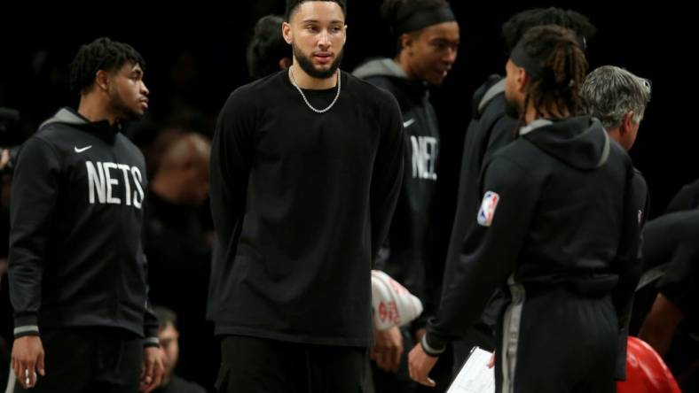 Mar 31, 2023; Brooklyn, New York, USA; Brooklyn Nets injured guard Ben Simmons (10) during a time out during the third quarter against the Atlanta Hawks at Barclays Center. Mandatory Credit: Brad Penner-USA TODAY Sports