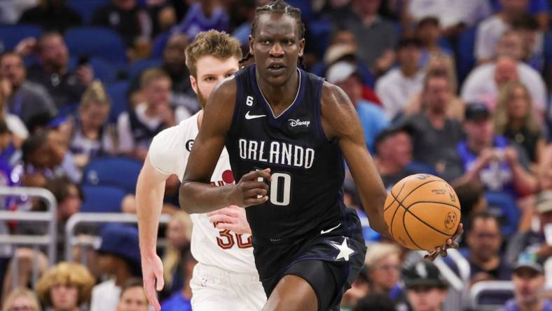 Apr 6, 2023; Orlando, Florida, USA; Orlando Magic center Bol Bol (10) brings the ball up court during the second half against the Cleveland Cavaliers at Amway Center. Mandatory Credit: Mike Watters-USA TODAY Sports