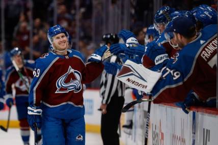 Apr 11, 2023; Denver, Colorado, USA; Colorado Avalanche center Ben Meyers (59) celebrates with the bench after a goal in the first period against the Edmonton Oilers at Ball Arena. Mandatory Credit: Isaiah J. Downing-USA TODAY Sports