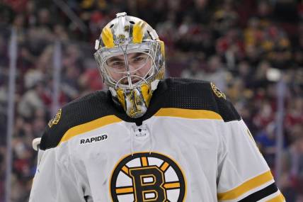 Apr 13, 2023; Montreal, Quebec, CAN; Boston Bruins goalie Jeremy Swayman (1) takes a breather during the second period of the game against the Montreal Canadiens at the Bell Centre. Mandatory Credit: Eric Bolte-USA TODAY Sports