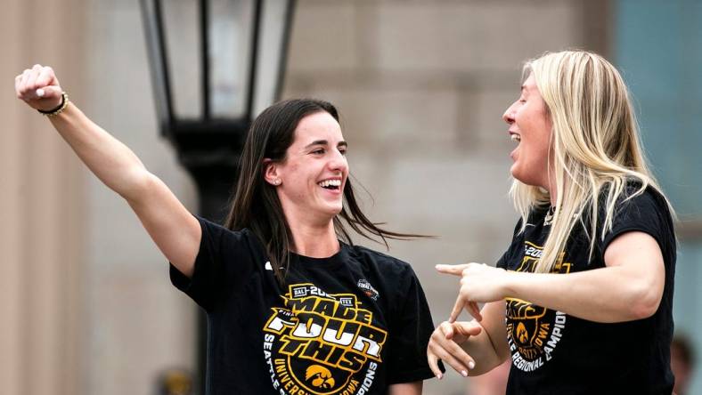 Iowa guard Caitlin Clark, left, celebrates with teammate center Monika Czinano during a ceremony honoring the women's basketball team, Friday, April 14, 2023, at the Pentacrest in Iowa City, Iowa.

230414 Iowa Wbb Ceremony 023 Jpg