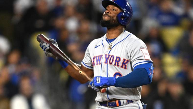 Apr 18, 2023; Los Angeles, California, USA; New York Mets right fielder Starling Marte (6) reacts after striking out in the third inning against the Los Angeles Dodgers at Dodger Stadium. Mandatory Credit: Jayne Kamin-Oncea-USA TODAY Sports