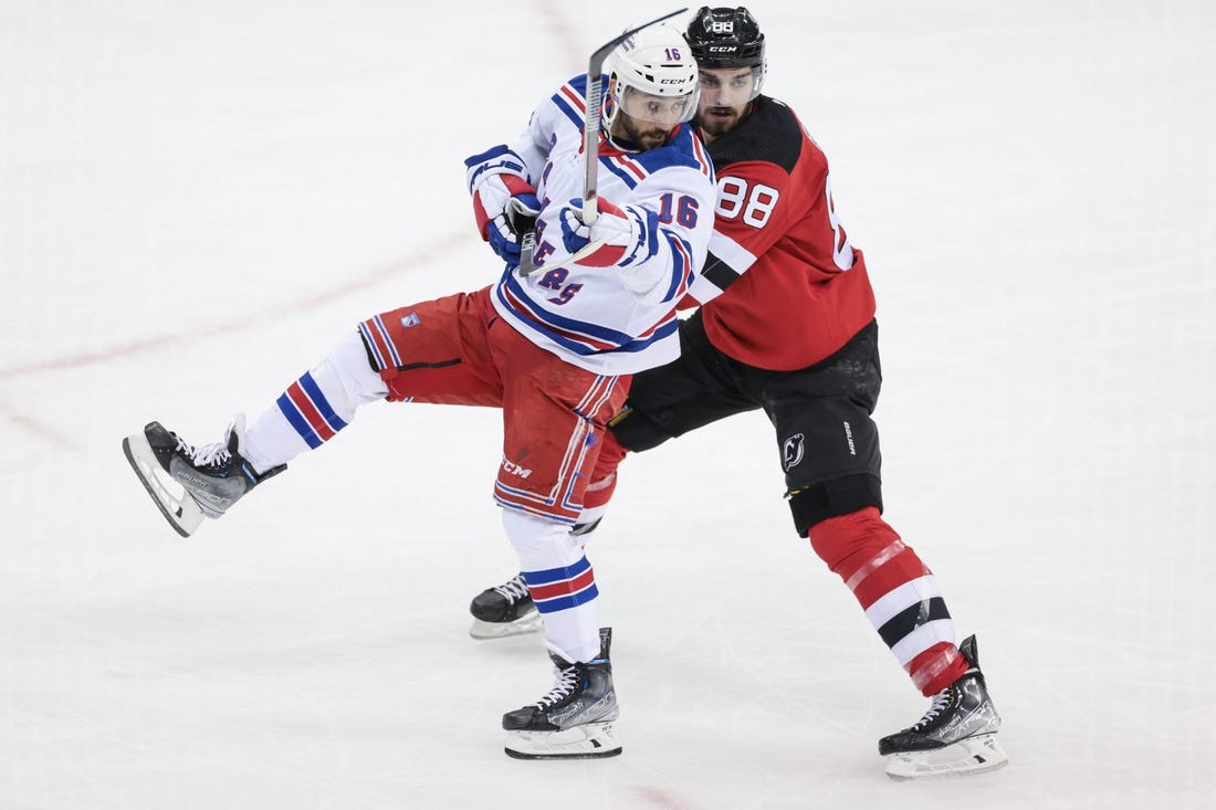 Apr 20, 2023; Newark, New Jersey, USA; New York Rangers center Vincent Trocheck (16) and New Jersey Devils defenseman Kevin Bahl (88) during the first period in game two of the first round of the 2023 Stanley Cup Playoffs at Prudential Center. Mandatory Credit: Vincent Carchietta-USA TODAY Sports