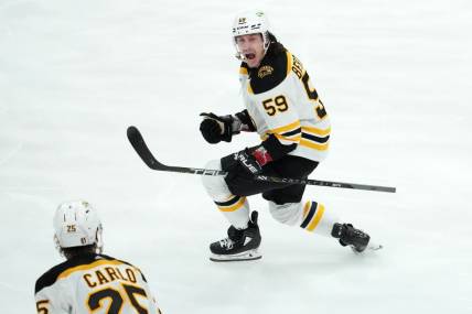 Apr 23, 2023; Sunrise, Florida, USA; Boston Bruins left wing Tyler Bertuzzi (59) celebrates his goal against the Florida Panthers during the third period of game four in the first round of the 2023 Stanley Cup Playoffs at FLA Live Arena. Mandatory Credit: Jasen Vinlove-USA TODAY Sports