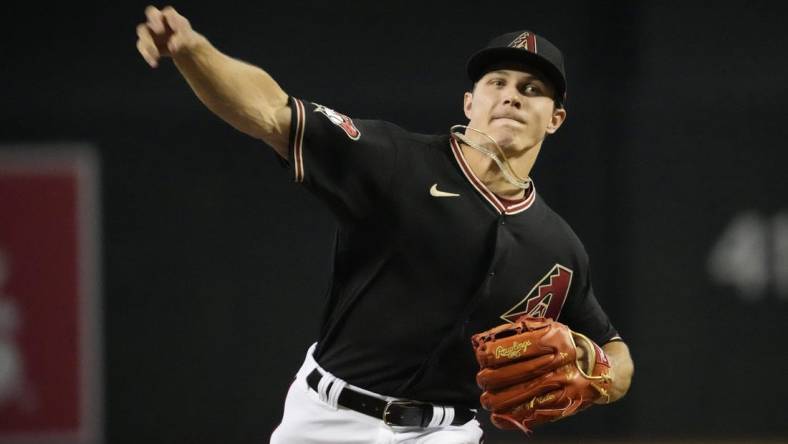 Arizona Diamondbacks starting pitcher Drey Jameson (99) throws against the San Diego Padres during the first inning at Chase Field on April 23, 2023.

Mlb Padres At D Backs