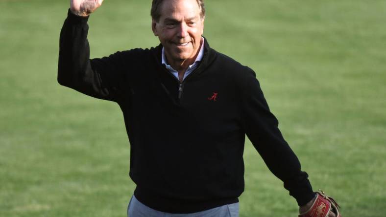 Alabama head football coach Nick Saban waves to the crowd after throwing out the first pitch before the Crimson Tide  s game with Samford at Sewell-Thomas Stadium Tuesday April 25, 2023.

College Baseball Alabama Vs Samford