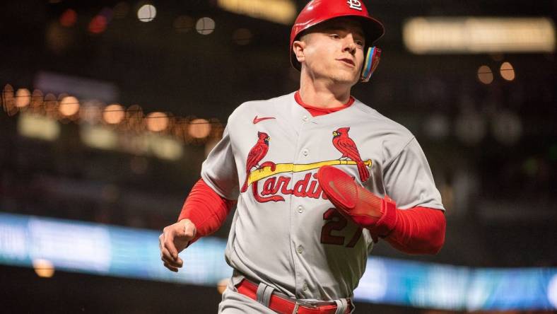 Apr 25, 2023; San Francisco, California, USA;  St. Louis Cardinals center fielder Tyler O'Neill (27) scores a run during the eighth inning against the San Francisco Giants at Oracle Park. Mandatory Credit: Ed Szczepanski-USA TODAY Sports