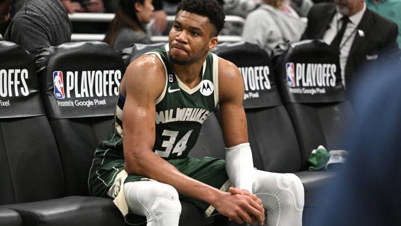 Apr 26, 2023; Milwaukee, Wisconsin, USA; Milwaukee Bucks forward Giannis Antetokounmpo (34) sits on the bench after a 128-126 loss to the Miami Heat during game five of the 2023 NBA Playoffs at Fiserv Forum. Mandatory Credit: Michael McLoone-USA TODAY Sports