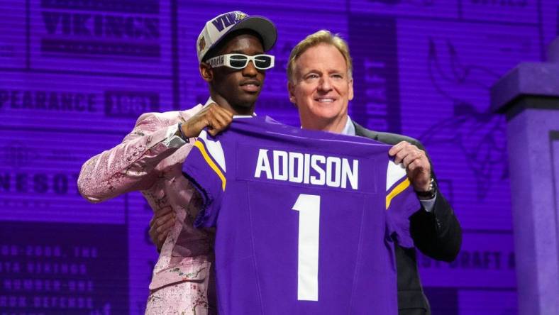 Apr 27, 2023; Kansas City, MO, USA; USC wide receiver Jordan Addison with NFL commissioner Roger Goodell after being selected by the Minnesota Vikings twenty third overall in the first round of the 2023 NFL Draft at Union Station. Mandatory Credit: Kirby Lee-USA TODAY Sports