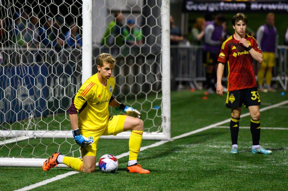 Apr 26, 2023; Tukwila, WA, USA; Seattle Sounders goalkeeper Stefan Cleveland (30) guards the ball during the game against the San Diego Loyal at Starfire Sports. Mandatory Credit: Steven Bisig-USA TODAY Sports