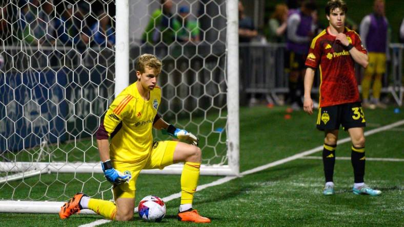 Apr 26, 2023; Tukwila, WA, USA; Seattle Sounders goalkeeper Stefan Cleveland (30) guards the ball during the game against the San Diego Loyal at Starfire Sports. Mandatory Credit: Steven Bisig-USA TODAY Sports