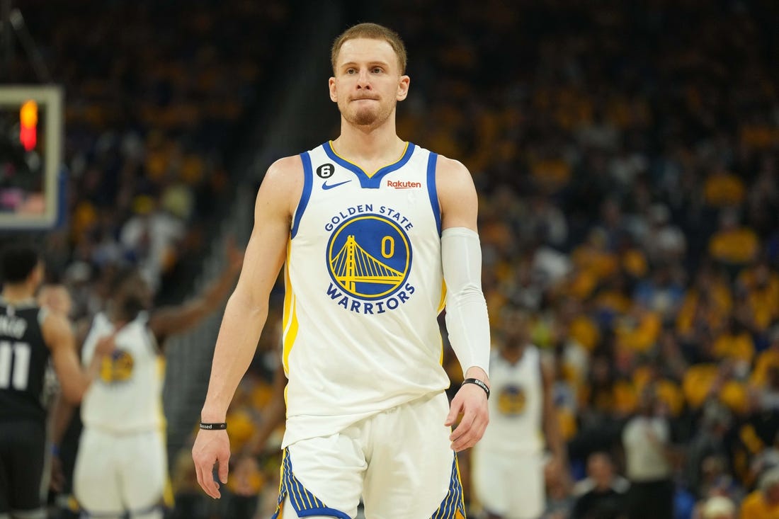 Apr 23, 2023; San Francisco, California, USA; Golden State Warriors guard Donte DiVincenzo (0) during the second quarter of game four of the 2023 NBA playoffs against the Sacramento Kings at Chase Center. Mandatory Credit: Darren Yamashita-USA TODAY Sports