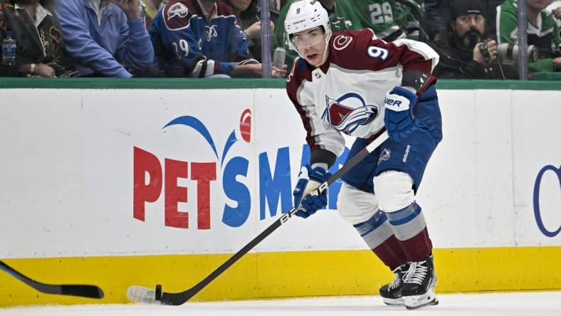 Mar 4, 2023; Dallas, Texas, USA; Colorado Avalanche center Evan Rodrigues (9) in action during the game between the Dallas Stars and the Colorado Avalanche at the American Airlines Center. Mandatory Credit: Jerome Miron-USA TODAY Sports