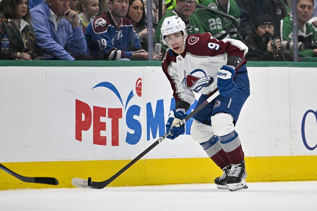 Mar 4, 2023; Dallas, Texas, USA; Colorado Avalanche center Evan Rodrigues (9) in action during the game between the Dallas Stars and the Colorado Avalanche at the American Airlines Center. Mandatory Credit: Jerome Miron-USA TODAY Sports