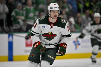 Apr 25, 2023; Dallas, Texas, USA; Minnesota Wild right wing Brandon Duhaime (21) in action during the game between the Dallas Stars and the Minnesota Wild in game five of the first round of the 2023 Stanley Cup Playoffs at American Airlines Center. Mandatory Credit: Jerome Miron-USA TODAY Sports