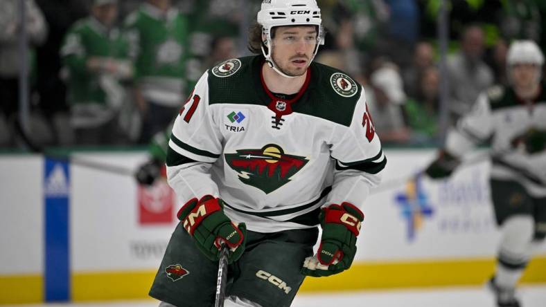 Apr 25, 2023; Dallas, Texas, USA; Minnesota Wild right wing Brandon Duhaime (21) in action during the game between the Dallas Stars and the Minnesota Wild in game five of the first round of the 2023 Stanley Cup Playoffs at American Airlines Center. Mandatory Credit: Jerome Miron-USA TODAY Sports