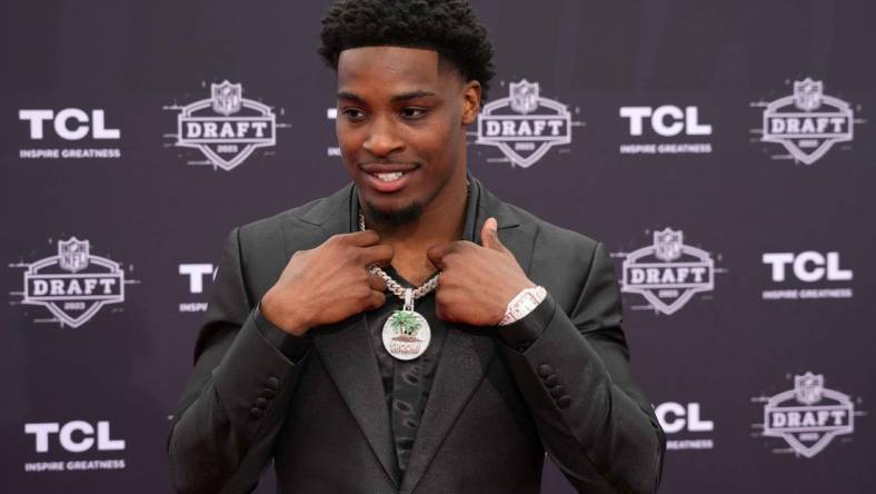 Apr 27, 2023; Kansas City, MO, USA; Illinois Fighting Illini cornerback Devon Witherspoon poses on the red carpet at the National World War I Museum and Memorial. Mandatory Credit: Kirby Lee-USA TODAY Sports