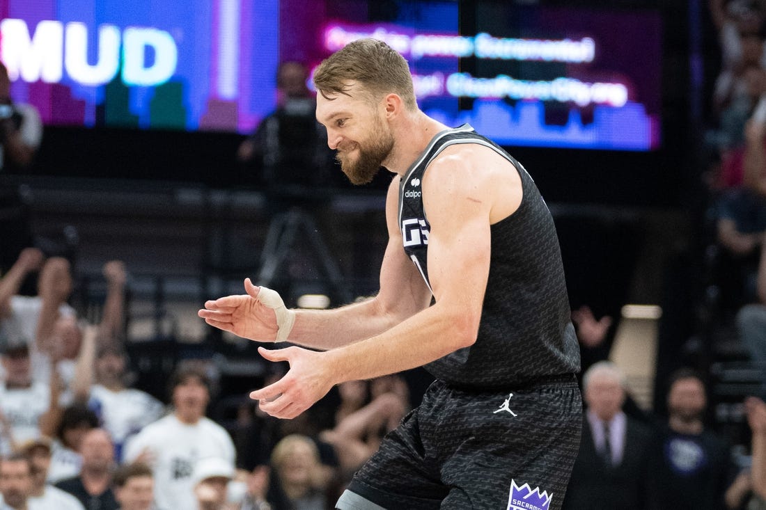 April 30, 2023; Sacramento, California, USA; Sacramento Kings forward Domantas Sabonis (10) celebrates against the Golden State Warriors during the second quarter in game seven of the 2023 NBA playoffs first round at Golden 1 Center. Mandatory Credit: Kyle Terada-USA TODAY Sports