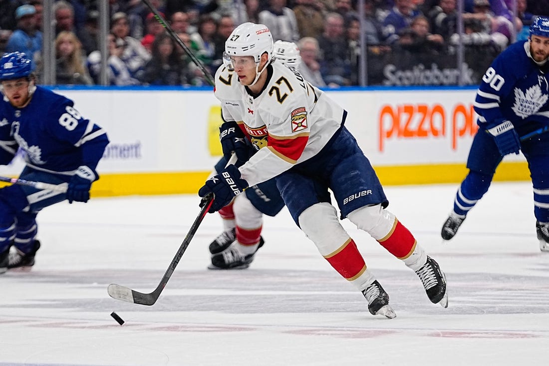 May 4, 2023; Toronto, Ontario, CANADA; Florida Panthers forward Eetu Luostarinen (27) carries the puck against the Toronto Maple Leafs during game two of the second round of the 2023 Stanley Cup Playoffs at Scotiabank Arena. Mandatory Credit: John E. Sokolowski-USA TODAY Sports