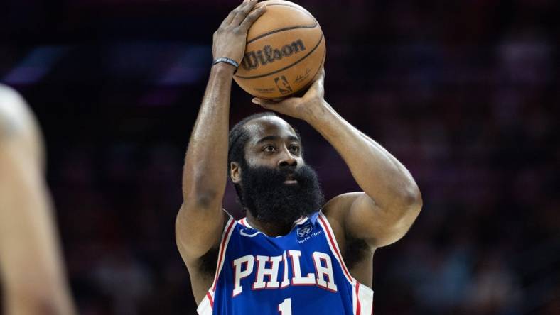 May 11, 2023; Philadelphia, Pennsylvania, USA; Philadelphia 76ers guard James Harden (1) shoots against the Boston Celtics during the first quarter in game six of the 2023 NBA playoffs at Wells Fargo Center. Mandatory Credit: Bill Streicher-USA TODAY Sports