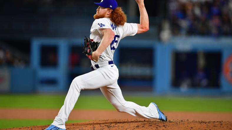 May 12, 2023; Los Angeles, California, USA; Los Angeles Dodgers starting pitcher Dustin May (85) throws against the San Diego Padres during the fourth inning at Dodger Stadium. Mandatory Credit: Gary A. Vasquez-USA TODAY Sports