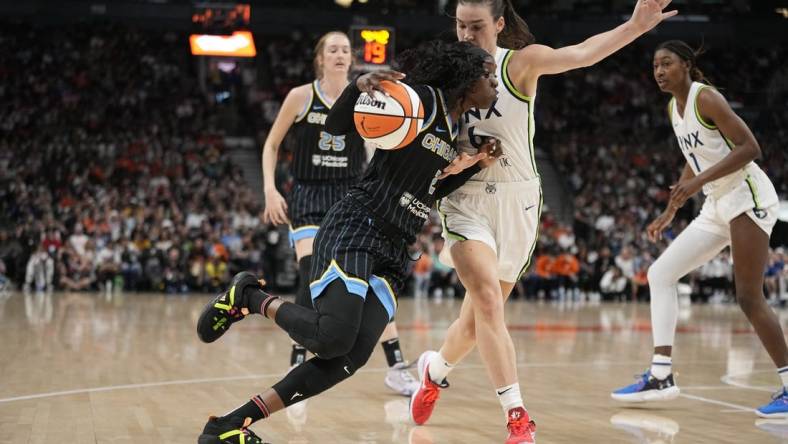 May 13, 2023; Toronto, Ontario, Canada; Chicago Sky guard Kahleah Copper (2) drives to the net against Minnesota Lynx forward Bridget Carleton (6) during the first half at Scotiabank Arena. Mandatory Credit: John E. Sokolowski-USA TODAY Sports