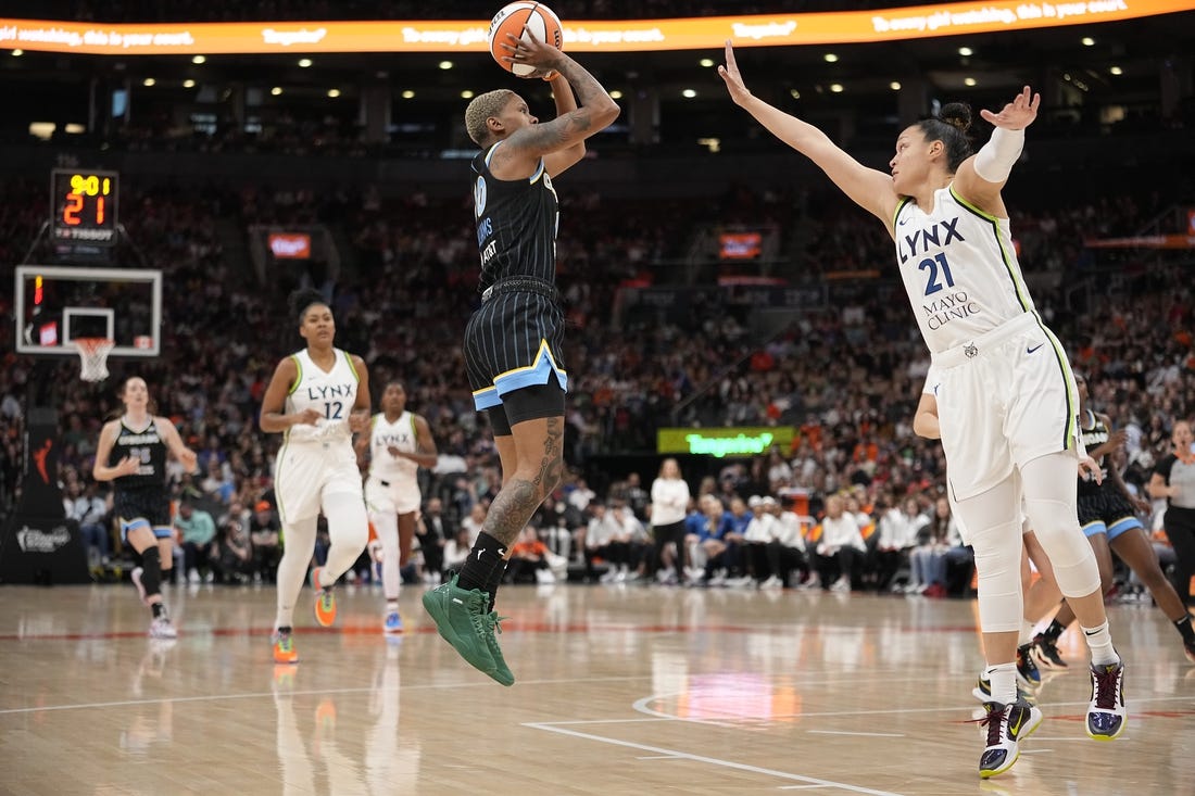 May 13, 2023; Toronto, Ontario, Canada; Minnesota Lynx guard Kayla McBride (21) goes to block a shot by Chicago Sky guard Courtney Williams (10) during the first half at Scotiabank Arena. Mandatory Credit: John E. Sokolowski-USA TODAY Sports