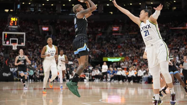 May 13, 2023; Toronto, Ontario, Canada; Minnesota Lynx guard Kayla McBride (21) goes to block a shot by Chicago Sky guard Courtney Williams (10) during the first half at Scotiabank Arena. Mandatory Credit: John E. Sokolowski-USA TODAY Sports