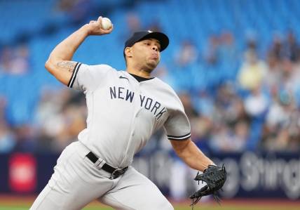 May 15, 2023; Toronto, Ontario, CAN; New York Yankees starting pitcher Jimmy Cordero (70) throws a pitch against the Toronto Blue Jays during the first inning at Rogers Centre. Mandatory Credit: Nick Turchiaro-USA TODAY Sports