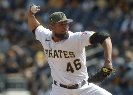 May 21, 2023; Pittsburgh, Pennsylvania, USA;  Pittsburgh Pirates relief pitcher Yohan Ramirez (46) pitches against the Arizona Diamondbacks during the eighth inning at PNC Park. Arizona won 8-3. Mandatory Credit: Charles LeClaire-USA TODAY Sports