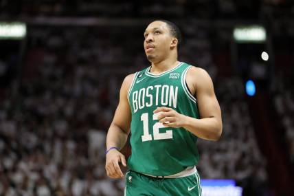 May 23, 2023; Miami, Florida, USA; Boston Celtics forward Grant Williams (12) looks on in the fourth quarter against the Miami Heat during game four of the Eastern Conference Finals for the 2023 NBA playoffs at Kaseya Center. Mandatory Credit: Sam Navarro-USA TODAY Sports