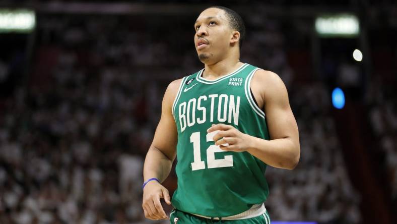 May 23, 2023; Miami, Florida, USA; Boston Celtics forward Grant Williams (12) looks on in the fourth quarter against the Miami Heat during game four of the Eastern Conference Finals for the 2023 NBA playoffs at Kaseya Center. Mandatory Credit: Sam Navarro-USA TODAY Sports