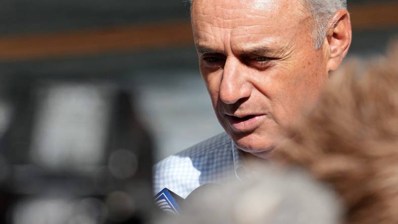 Major League Baseball commissioner Rob Manfred speaks to reporters before the Milwaukee Brewers game against the San Francisco Giants Thursday, May 25, 2023 at American Family Field in Milwaukee, Wis.