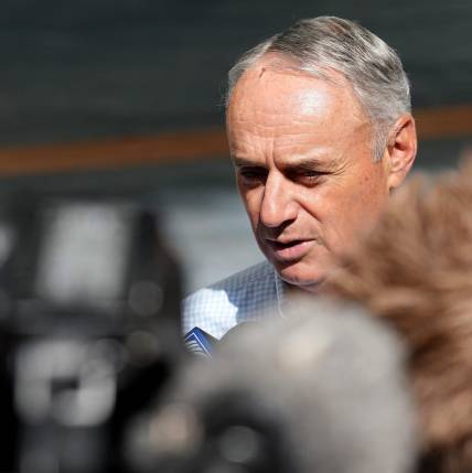 Major League Baseball commissioner Rob Manfred speaks to reporters before the Milwaukee Brewers game against the San Francisco Giants Thursday, May 25, 2023 at American Family Field in Milwaukee, Wis.