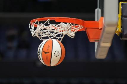 May 25, 2023; Los Angeles, California, USA; Wilson official basketball with WNBA logo goes through the net during the game between the LA Sparks and the Las Vegas Aces at Crypto.com Arena. Mandatory Credit: Kirby Lee-USA TODAY Sports