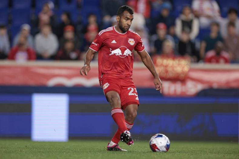 May 23, 2023; Harrison, NJ, USA; New York Red Bulls midfielder Cristian Casseres Jr (23) controls the ball against FC Cincinnati during the second half at Red Bull Arena. Mandatory Credit: Vincent Carchietta-USA TODAY Sports