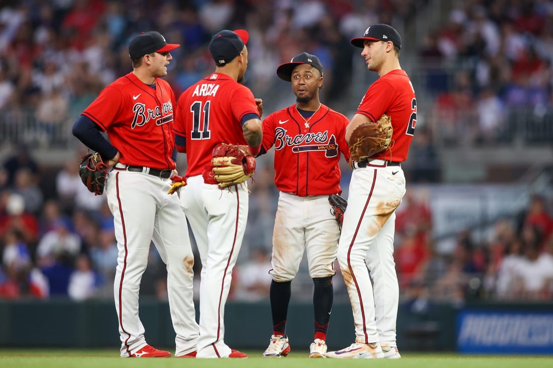 May 26, 2023; Atlanta, Georgia, USA; Atlanta Braves third baseman Austin Riley (27) and shortstop Orlando Arcia (11) and second baseman Ozzie Albies (1) and first baseman Matt Olson (28) talk during a pitching change against the Philadelphia Phillies in the sixth inning at Truist Park. Mandatory Credit: Brett Davis-USA TODAY Sports