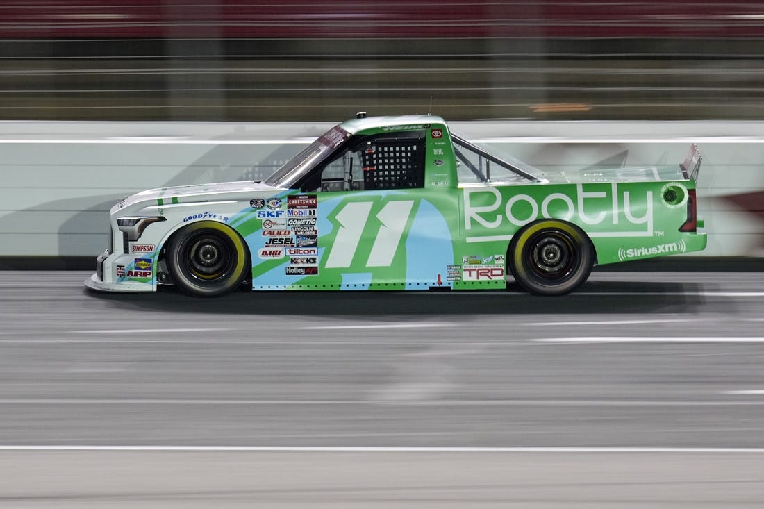 May 26, 2023; Concord, North Carolina, USA; NASCAR Craftsman Truck Series driver Corey Heim (11) during the North Carolina Education Lottery 200 at Charlotte Motor Speedway. Mandatory Credit: Jim Dedmon-USA TODAY Sports