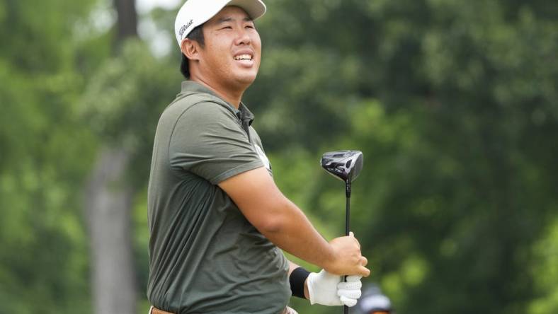 May 27, 2023; Fort Worth, Texas, USA; Byeong Hun An watches his shot from the third tee during the third round of the Charles Schwab Challenge golf tournament. Mandatory Credit: Jim Cowsert-USA TODAY Sports