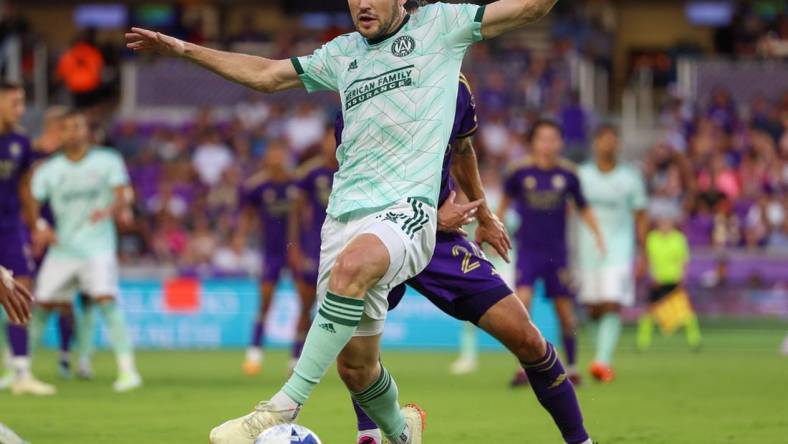 May 27, 2023; Orlando, Florida, USA;  Atlanta United FC defender Andrew Gutman (15) controls the ball against Orlando City SC in the first half at Exploria Stadium. Mandatory Credit: Nathan Ray Seebeck-USA TODAY Sports