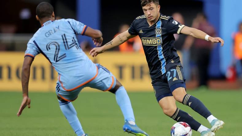 May 27, 2023; Flushing, New York, USA; Philadelphia Union defender Kai Wagner (27) controls the ball against New York City FC defender Tayvon Gray (24) during the first half at Citi Field. Mandatory Credit: Brad Penner-USA TODAY Sports