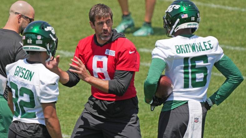 Florham Park, NJ May 31, 2023 -- Aaron Rodgers with Michael Carter and Jason Brownlee during the Jets OTA.