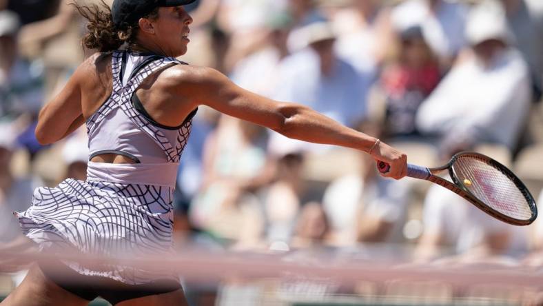 Jun 1, 2023; Paris,France; Madison Keys (USA) returns a shot during her match against Kayla Day (USA) on day five at Stade Roland-Garros. Mandatory Credit: Susan Mullane-USA TODAY Sports