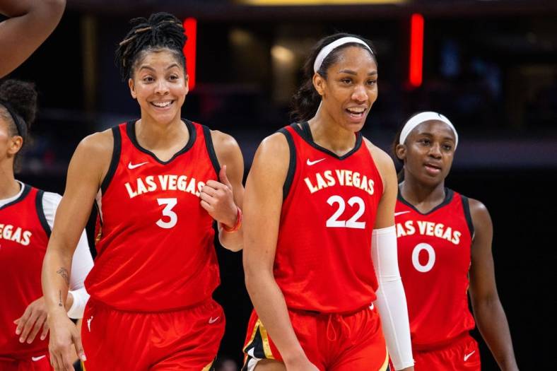 Jun 4, 2023; Indianapolis, Indiana, USA; Las Vegas Aces forward Candace Parker (3) and forward A'ja Wilson (22) celebrates the win against the Indiana Fever  at Gainbridge Fieldhouse. Mandatory Credit: Trevor Ruszkowski-USA TODAY Sports