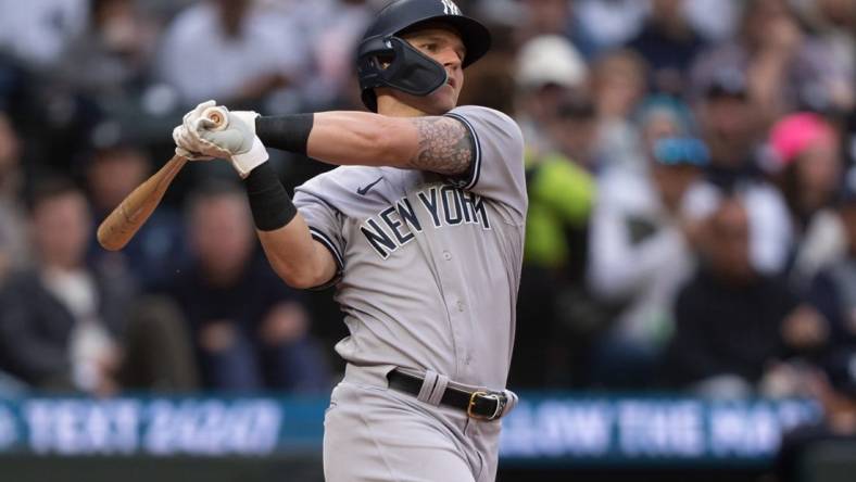 May 31, 2023; Seattle, Washington, USA; New York Yankees first baseman Jake Bauers (61) takes a swing during an at-bat against the Seattle Mariners at T-Mobile Park. Mandatory Credit: Stephen Brashear-USA TODAY Sports