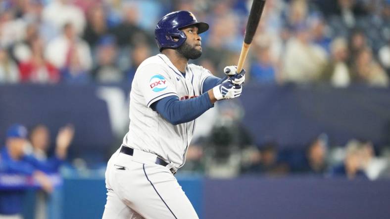 Jun 7, 2023; Toronto, Ontario, CAN; Houston Astros designated hitter Yordan Alvarez (44) hits a two run home run during the fourth inning against the Toronto Blue Jays at Rogers Centre. Mandatory Credit: Nick Turchiaro-USA TODAY Sports