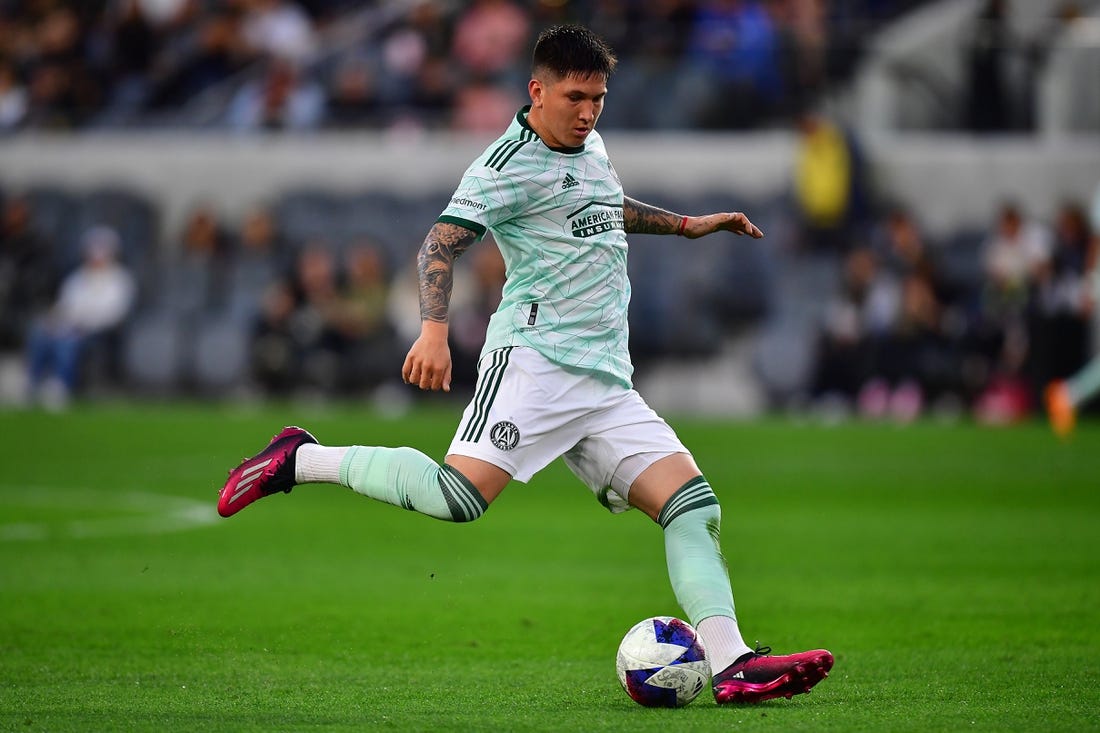 Jun 7, 2023; Los Angeles, California, USA; Atlanta United midfielder Franco Ibarra (14) passes the ball against Los Angeles FC during the first half at BMO Stadium. Mandatory Credit: Gary A. Vasquez-USA TODAY Sports