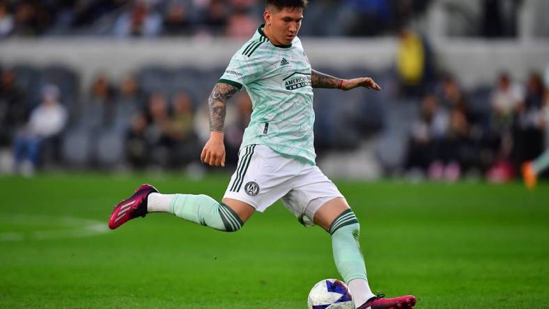 Jun 7, 2023; Los Angeles, California, USA; Atlanta United midfielder Franco Ibarra (14) passes the ball against Los Angeles FC during the first half at BMO Stadium. Mandatory Credit: Gary A. Vasquez-USA TODAY Sports