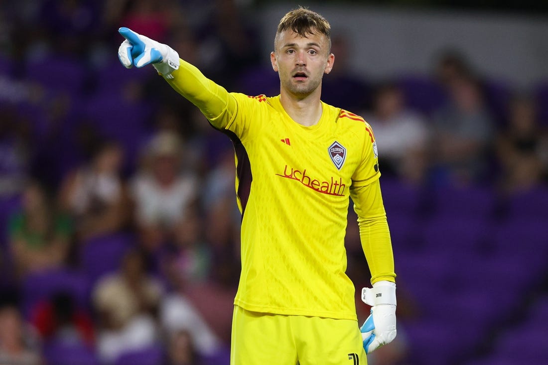 Jun 10, 2023; Orlando, Florida, USA;  Colorado Rapids goalkeeper Marko Ilic (1) directs his team during a free kick against Orlando City SC in the second half at Exploria Stadium. Mandatory Credit: Nathan Ray Seebeck-USA TODAY Sports